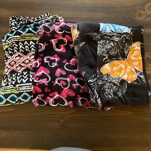 Bundle of 3 leggings by various brands. All 3 pairs are OS